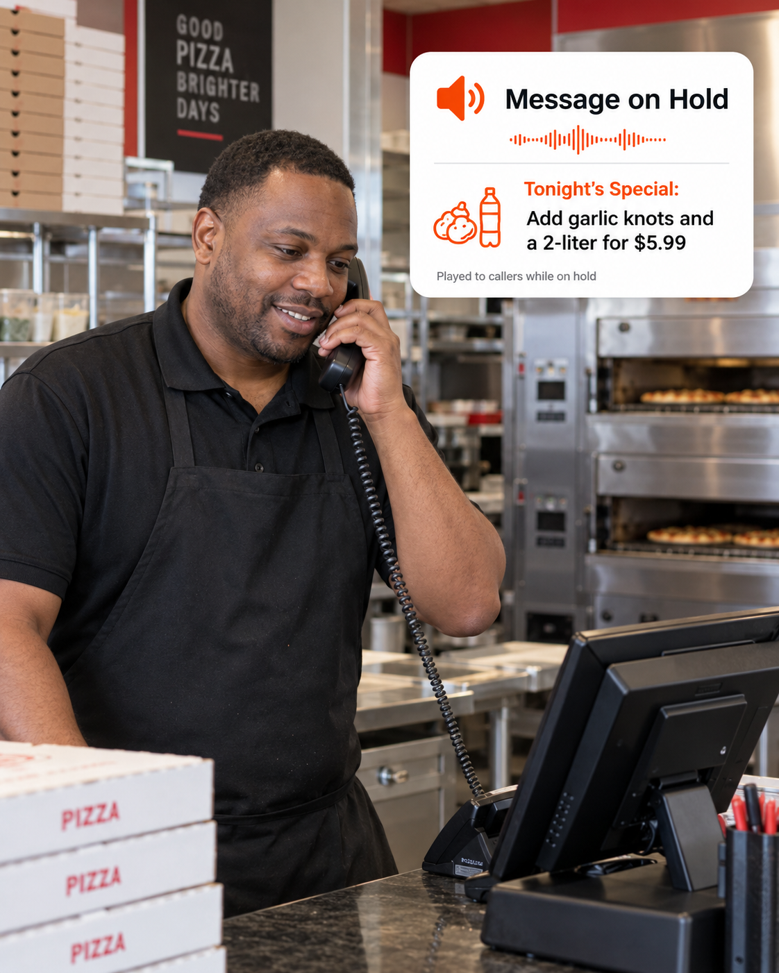 A pizzeria team member on the phone while an on-hold upsell message plays to the caller